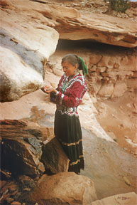 Navajo Maiden Gathering Water at a Spring Offered as art prints